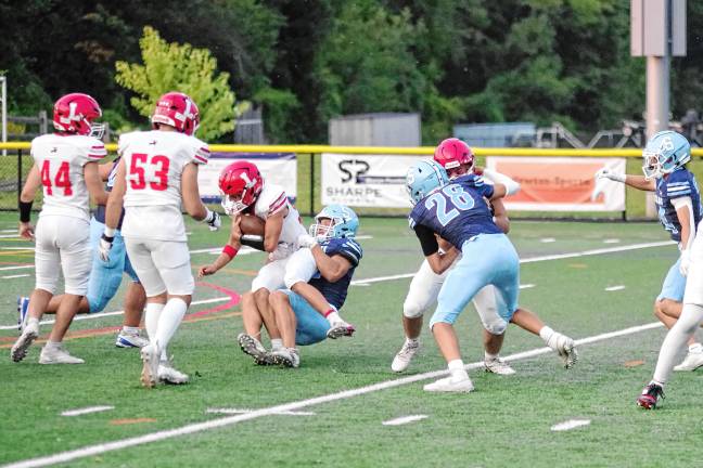 Vernon shuts out Dover <b>FB3 A Lakeland ball carrier is taken down by a Sparta tackler.</b>