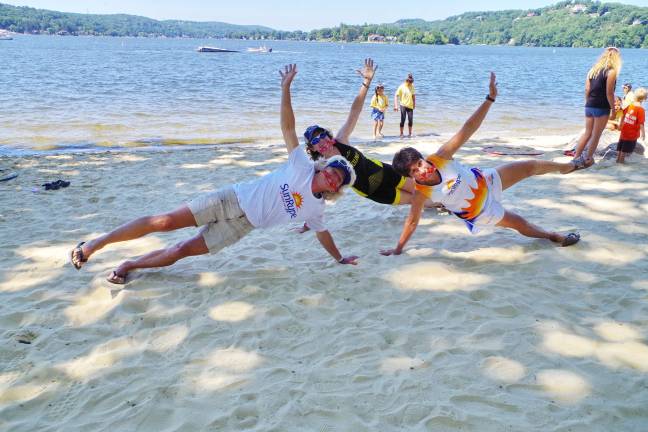 Another big triathlon for Pass it Along Triathletes in their fit fifties are Tracey Swenson (53) of Sparta, N.J., Barbara Foley (59) of Montclair, N.J. and Angie Dello (54) of Whippany, N.J. in a post triathlon pose.