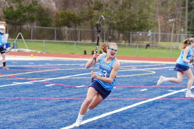 Mead leads Sparta girls to lacrosse victory over Pope John Sparta's Mead on the move.