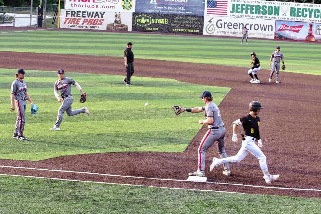 Miners lead division <b>MN1 The Sussex County Miners’ Hunter D'Amato (2) reaches first base before the ball in the second inning of a game against the Brockton Rox on Saturday, Aug. 2. The Miners won, 9-3. (Photos by George Leroy Hunter)</b>