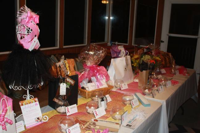 The evening&#x2019;s raffle prizes donated by local businesses and individuals to raise money for Susan G.Komen Foundation.