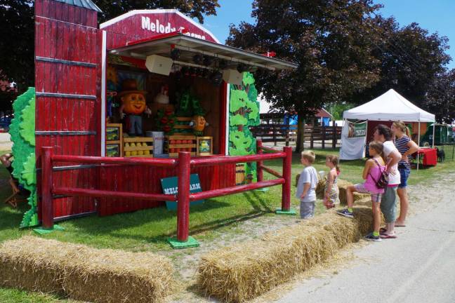 Fair fun The dancing and singing “Melody Farm Follies” was a favorite of the younger fairgoers who ventured down to area of the produce displays and competitions.