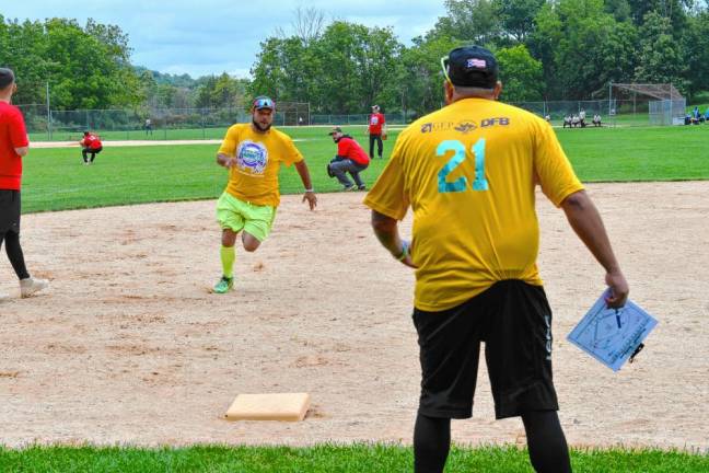 Photos: Bats for Barreto Softball Tournament A player on the run in the third annual Bats for Barreto Softball Tournament on Sept. 7 in Sparta. (Photos by Maria Kovic)