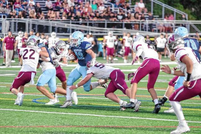 Shagawat nominated for Heart of a Giant Award <b>Sparta ball carrier Brady Shagawat on the run in the first half of the game against Newton on Friday, Sept. 19. He made three touchdowns and rushed for 96 yards. The Spartans won, 35-20. (Photo by George Leroy Hunter)</b>
