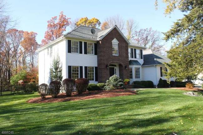 Four-bedroom Colonial in lovely setting Four-bedroom Colonial in lovely setting