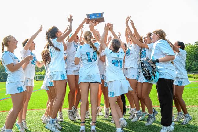 Photos: Spartans in Group 2 final The Spartans pose with their trophy.