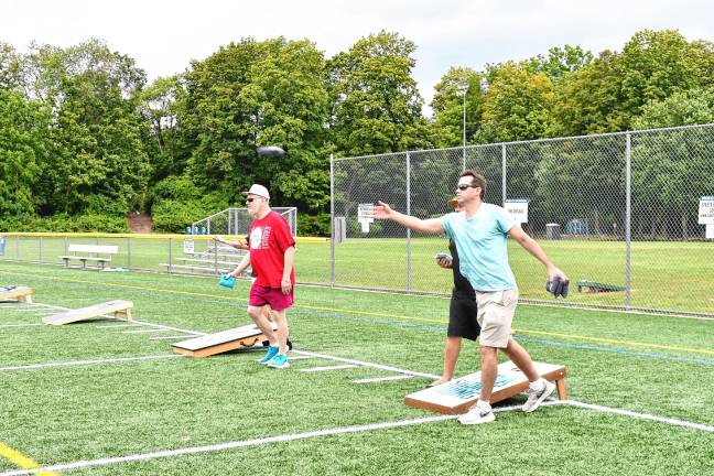 Photos: Cornhole Tournament Participants toss bags in the fifth annual Cornhole Tournament at Station Park in Sparta.