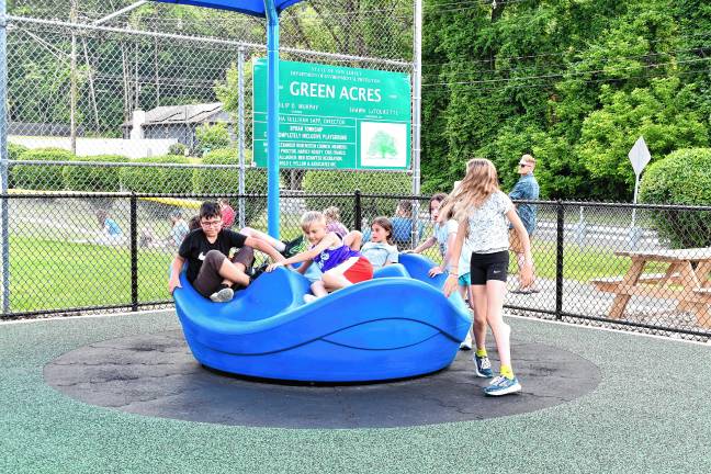 Inclusive playground opens CIP4 The new playground was funded by the state Green Acres program. (Photo by Maria Kovic)