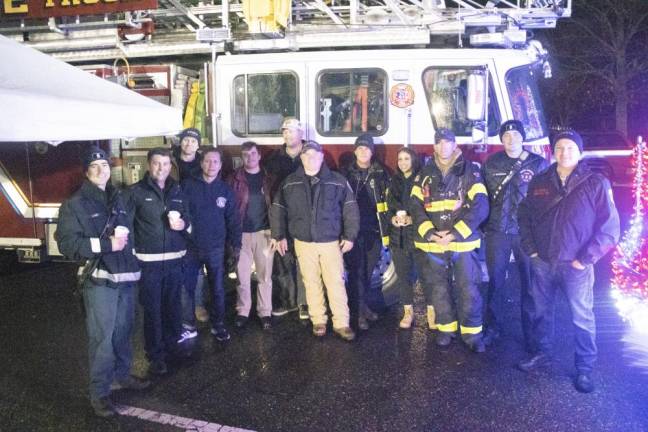 Sparta firefighters brought Santa to the ceremony.