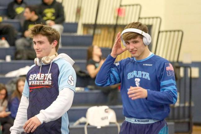 Champion brothers Garrett and Spencer Stewart take a deserved breather between matches.