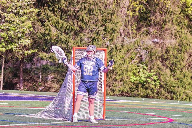 Sports roundup: Lions advance to H/W/S quarterfinal Pope John goalkeeper Daniel O'Leary stands guard in front of the goalpost. He made five saves.