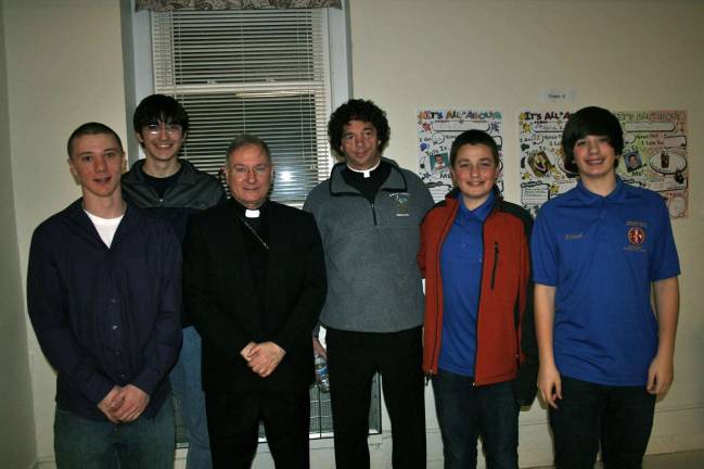 Bishop Serratelli join Squires for pizza From left, Vincenzo Pellicani, Sebastian Cook, Bishop Serratelli, Father Tom Fallone, Matthew Dolecki, and Michael Dolecki.