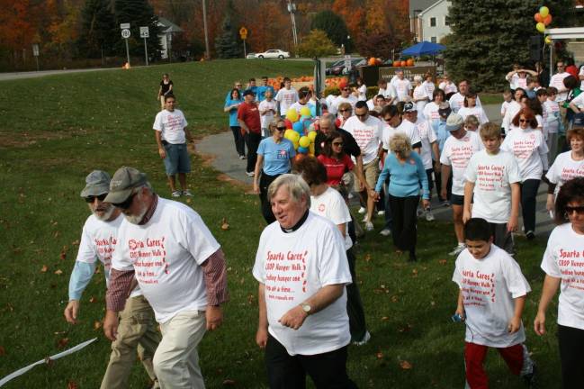 Rev. Patrick Rice, a man to remember Fr.Rice leading the Sparta Hunger Crop Walk.
