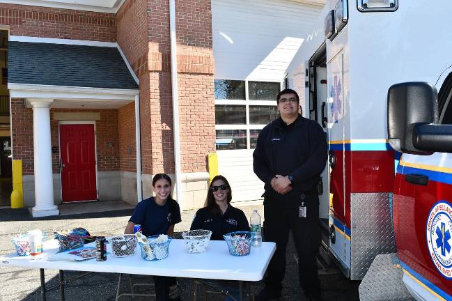 Sparta Township observes Fire Prevention Week Lucye Wolfson ( Fire Dept). Alex Castiglia ( Sparta Ambulance Squad) and Matthew Enriquez ( Sparta Ambulance Squad ) are shown.