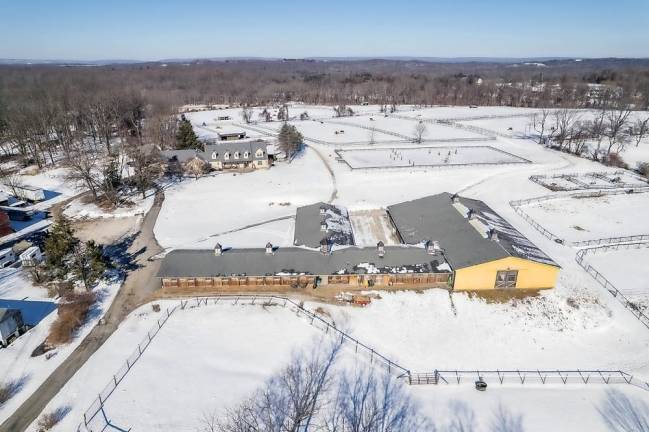 Modern equestrian facility comes with renovated home Modern equestrian facility comes with renovated home