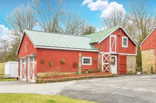 Become self-sufficient with this beautiful 26-acre working farm