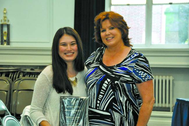 Students recognized at meeting Sparta Mayor Molly Whilesmith is pictured with Isabella Cuan, the Sparta High School Distinguished Student Award winner for 2014.