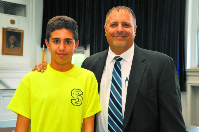 Students recognized at meeting Buddy Al-Aydi, 14, was one of the eighth grade students on the Emerald Team at the Sparta Middle School, recognized as one of the “Students of the Marking Period,” for the fourth marking period. He is pictured with Sparta Middle School Assistant Principal Brad Davis.