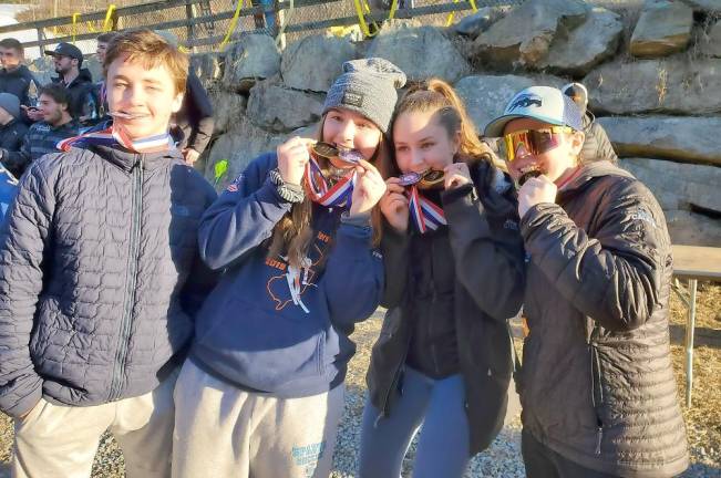 NJAC 2020 Ski Champions Sparta Racers With Award Medals at State Championships (left to right); Captain Connor McAndris, Captain Olivia Finkeldie, Jillian Stote & Claudia Calafati.