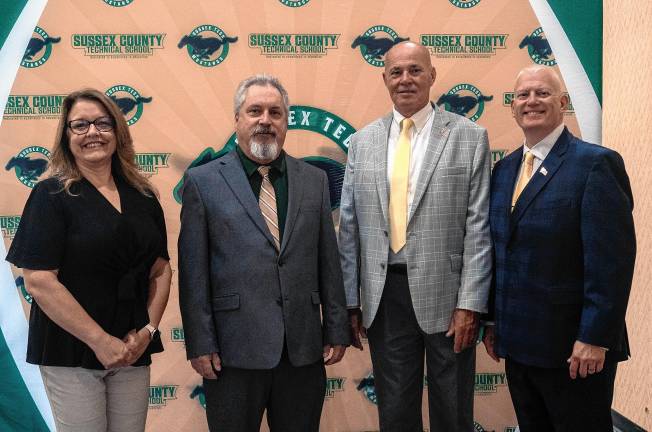 Photos: Sussex County Technical School graduation Sussex Tech school board members, from left, are Jennifer Buckalew, Robert Heiden and Christopher Cameron with Sussex County Commissioner Alan Henderson, second from right.