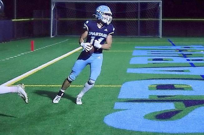 Sparta wide receiver Luke Szabo is in the end zone after scoring a touchdown in the second quarter. (George Leroy Hunter)