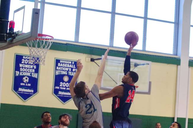 Brookdale crushes SCCC in boys hoops Sussex County's Aiden Black tries to stop the shot from Brookdale's Jordan Little. Little scored eight points and grabbed ten rebounds. Photos by George Leroy Hunter