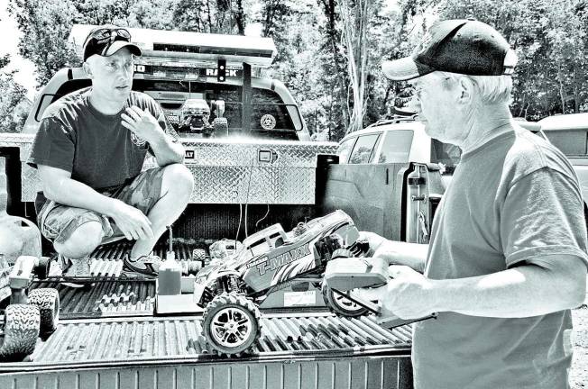 New RC racing car park<saxo:ch value=226 128 168/> opens in Matamoras' Airport Park Father and son Nate, left, and Bill Yingling prepare their vehicles for the opening day races.