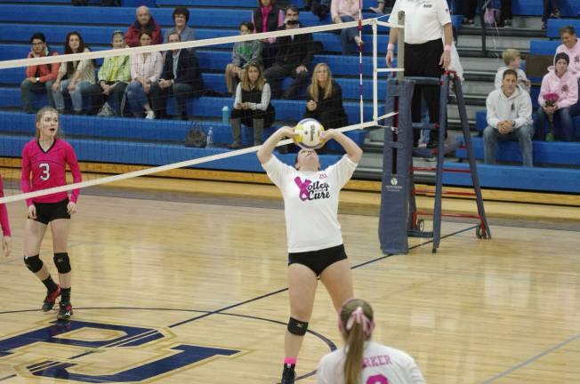 Pope john bests Jefferson in volleyball Pope John's Meaghan Lawrence taps the ball. Lawrence accomplished three aces, nine service points, one kill, twenty four assists and four digs. Photos by George leroy Hunter
