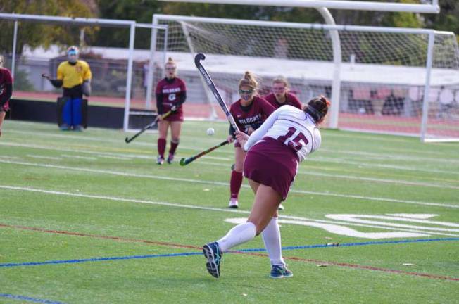 Newton bests Whippany Park in field hockey Newton's Nicole Rizzo hits the ball towards the goal post. Rizzo scored one goal.