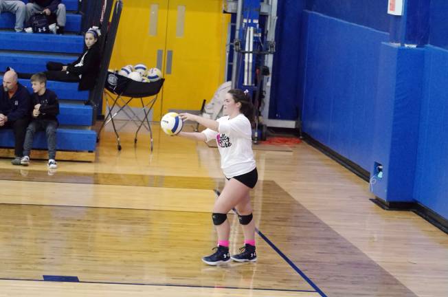 Pope john bests Jefferson in volleyball Pope John's Meaghan Lawrence about to serve.