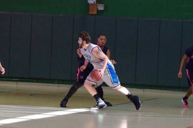 Brookdale crushes SCCC in boys hoops Sussex County's Nick Ramirez dribbles the ball past Brookdale's Jordan Little.