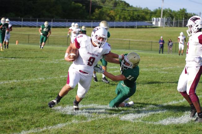 Roselle Park whups Tech, 33-7 Roselle Park running back Vincent Figueredo (9) stiff-arms Sussex Tech defender Ryan Kinkead in the third quarter.