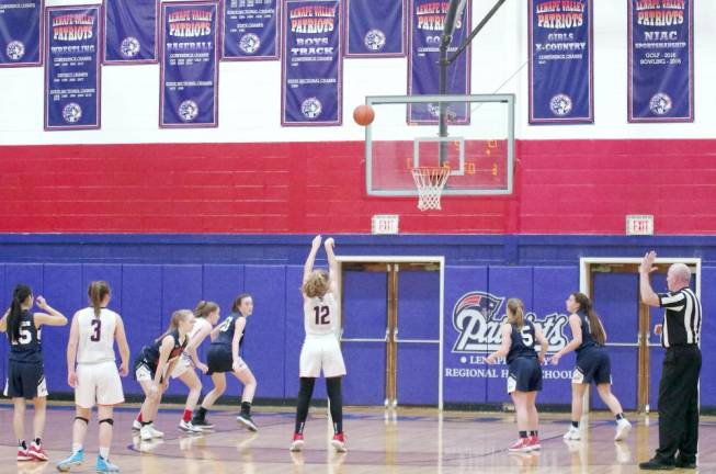 Lenape Valley's Brienna Pangborn handles the ball during a foul shot in the first half. Pangborn scored 19 points, grabbed 10 rebounds and is credited with 1 steal.