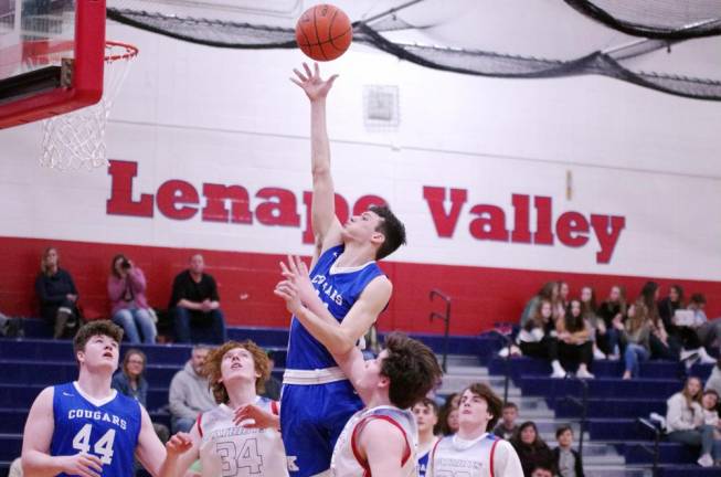 Kittatinny's Dylan Modafferi releases the ball during a shot in the second half. Modafferi scored 19 points.