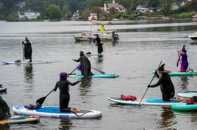 Participants in the Witches Paddle set off. (Photo by Nancy Madacsi)
