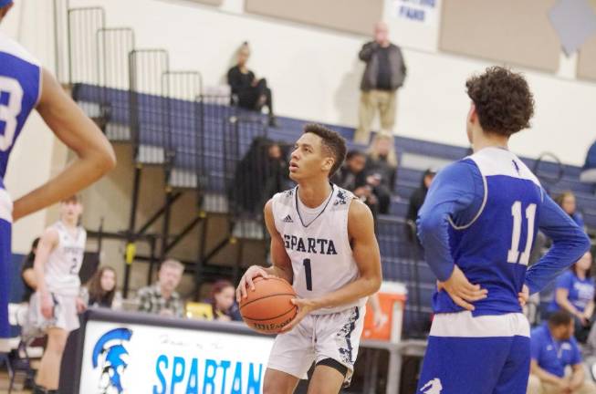 Sparta vs. Teaneck Sparta's Rashir Scott is about to attempt a shot from the foul line in the first half. Scott scored 1 point.