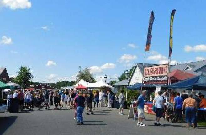 Sunny skies draw thousands to Fairgrounds for Sussex County Day Attendees lined up to sample barbecue from various vendors vying to be the People's Choice Winner