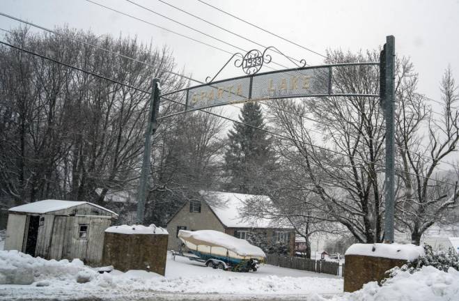 Snow piles up near the Sparta Lake gate Sunday, Jan. 7.