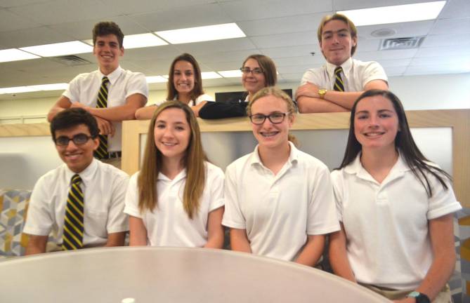 Front row, left to right: Mukundhan, Olivia O’Hearn, Potts, and Natalie O’Hearn. Back row: Fowler, McNally, Mundt, and Gallo. Pope John XXIII Regional High School seniors Ashley Potts, Emily Mundt, Douglas Fowler, Hunter Gallo, Bridget McNally, Rohan Mukundhan, Natalie O’Hearn and Olivia O’Hearn are National Merit Scholarship award winners. Mundt and Potts have been named National Merit Scholarship semifinalists, while Fowler, Gallo, McNally, Mukundhan, Natalie O’Hearn and Olivia O’Hearn have been named Commended Scholars.