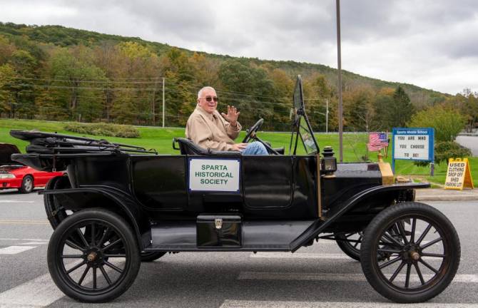 Joe Warner sits in the Sparta Historical Society’s Model T.