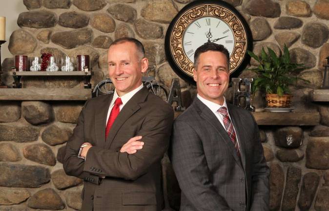 Local lawyers honored as top attorneys Attorneys William P. Askin, left, and Todd M. Hooker