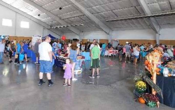Sunny skies draw thousands to Fairgrounds for Sussex County Day Sussex County Day, organized by the Sussex County Chamber of Commerce, included displays from municipalities, county services, and law enforcement, which were set up in the newly renovated Richards Building at the Sussex County Fairgrounds in Augusta