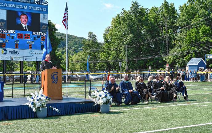 Photos: Sparta High School graduation Athletic director Steve Stoner speaks during the ceremony. He has organized the graduations for the past 15 years.