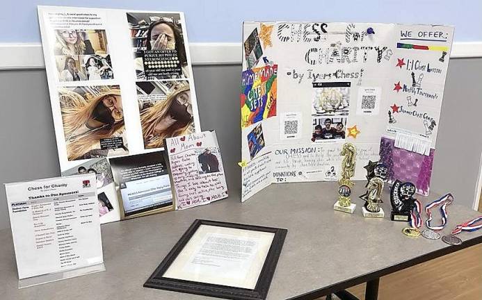 The library was adorned with photos of Erin Beebe and the sponsors of the event.