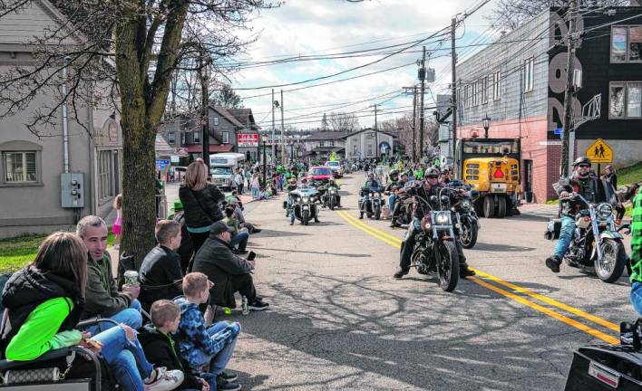 Several motorcycle clubs take part in the parade.