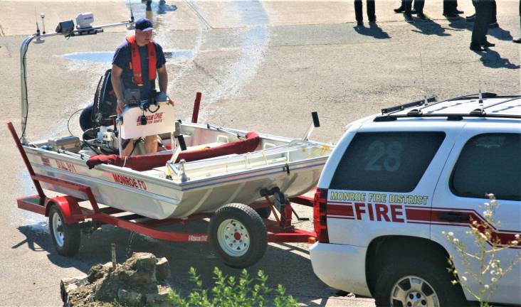 The Monroe, N.Y. Fire Department takes part in the search for a Chestnut Ridge man lost in Greenwood Lake.