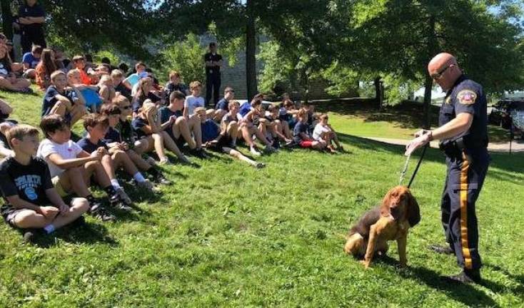Sparta Junior Police Academy graduates 70 Sparta Junior Police Academy cadets meet Nutmeg and her handler Mark Peer of the Sussex County Sheriff's Office K-9 unit. Photo provided by Junior Police Academy