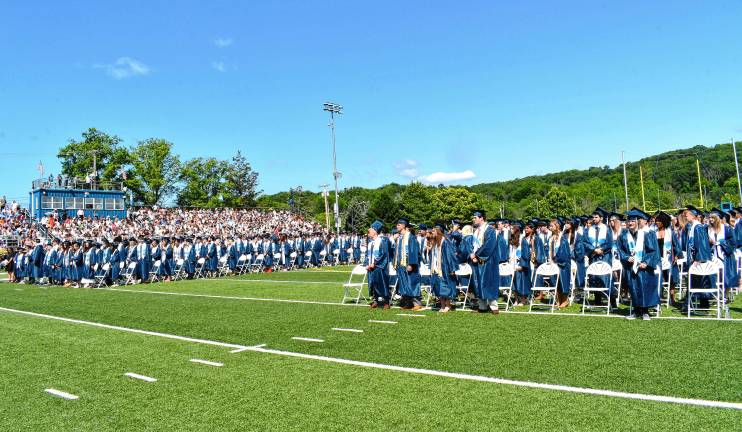 Photos: Sparta High School graduation The Sparta High School Class of 2025 stands during graduation Friday, June 20.