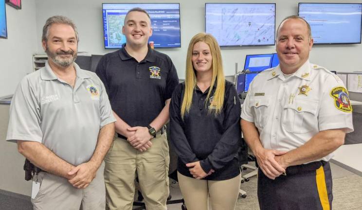 Sheriff promotes 9-1-1 officers From left: Mark Rozek, director; Brian Cannon and Shannon Quinn, senior public safety telecommunicators; and Michael Strada, Sussex County Sheriff (Photo provided)