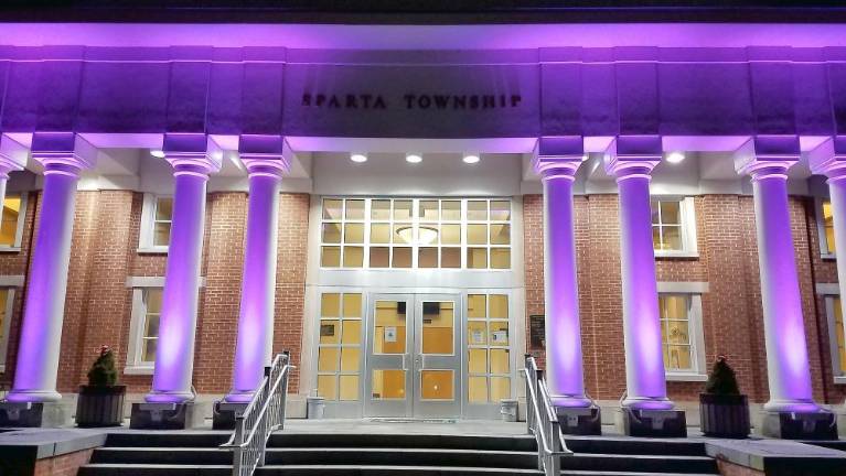 Sparta celebrates League of Women Voters Day Township Hall is illuminated in purple on Feb. 14, 2020 in celebration of League of Women Voters Day in Sparta.